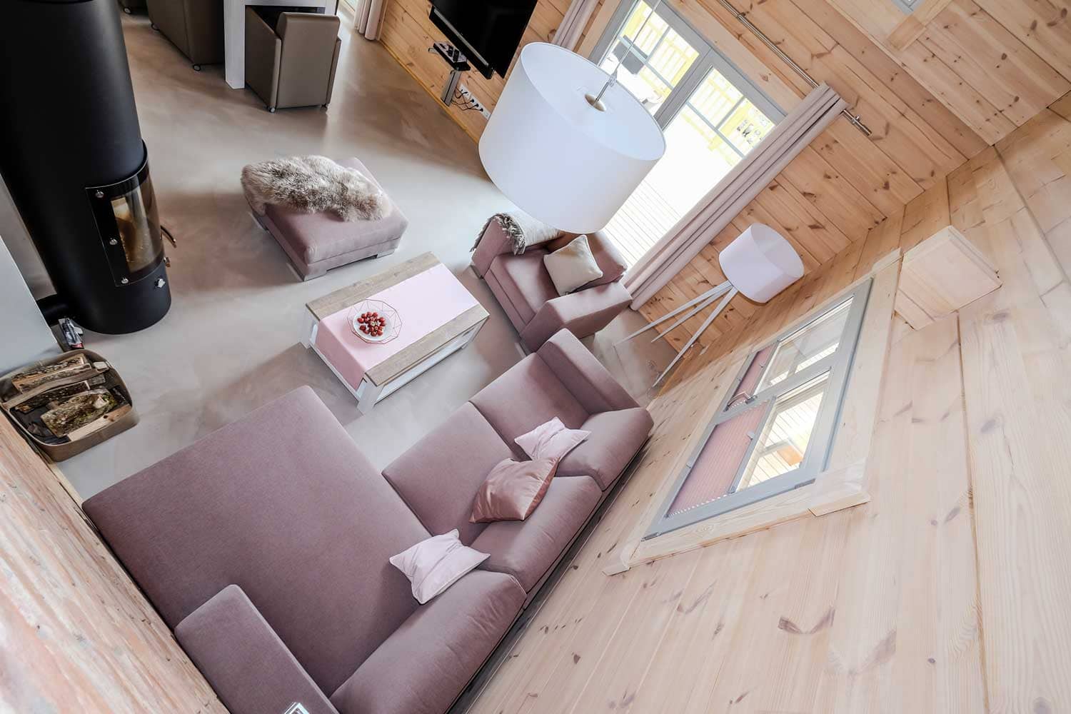 Lodge Blickfang – Wohnbereich mit Kaminofen