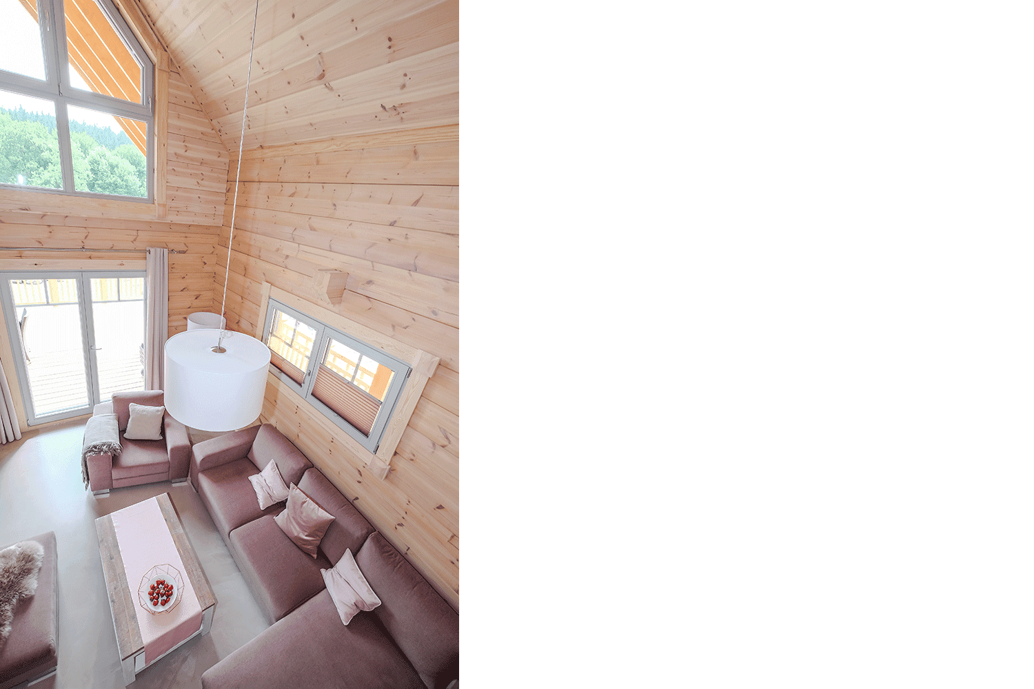 Lodge Blickfang – Wohnbereich mit Kaminofen