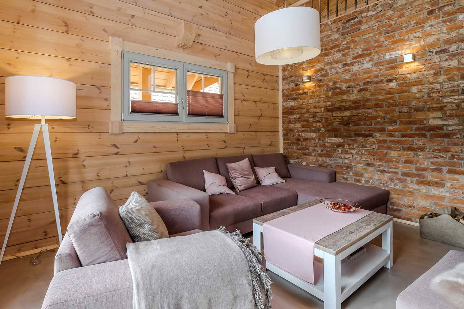 Lodge Blickfang – Wohnbereich mit Kaminofen